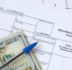 What is a 1099 employee tax form and independent contractor payment concept