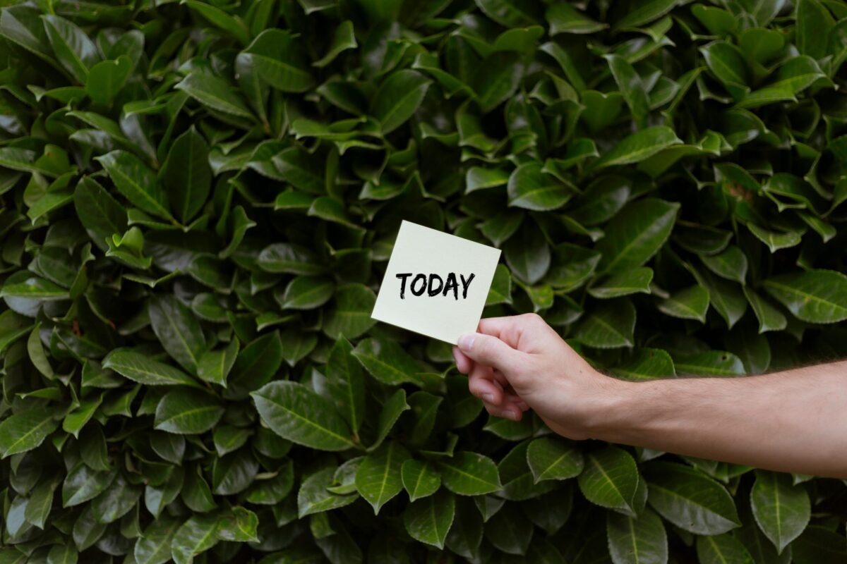 Hand holding a card labeled TODAY representing same-day personal loans in Salt Lake City, Utah