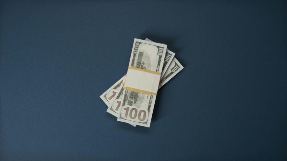 Stack of money representing the search for the best personal loans in Provo, Utah