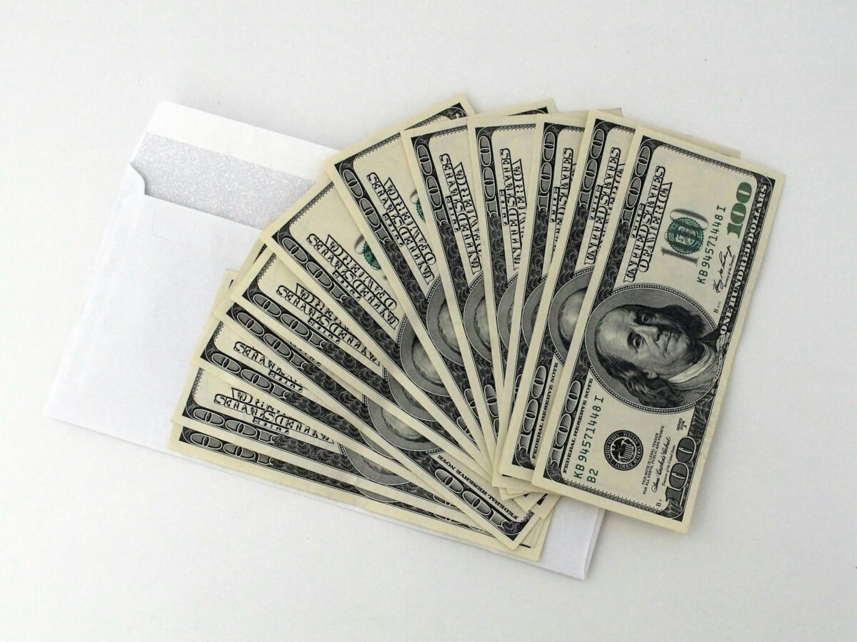 Stack of dollar bills symbolizing a leveraged loan in Pleasant Grove, Utah
